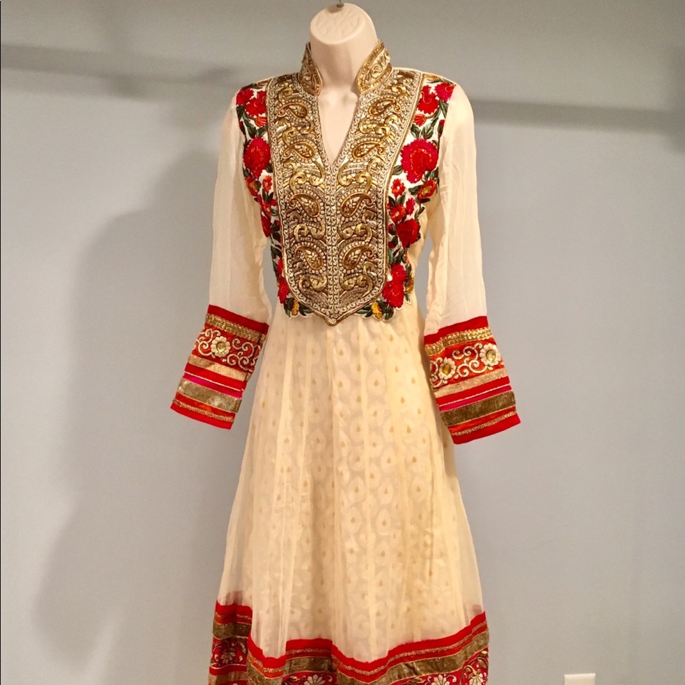 Traditional Indian beige, gold and red dress